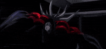 a man and a woman are fighting each other in a video game with a purple background .