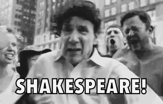 a man in a white shirt is surrounded by a crowd of people and says shakespeare .