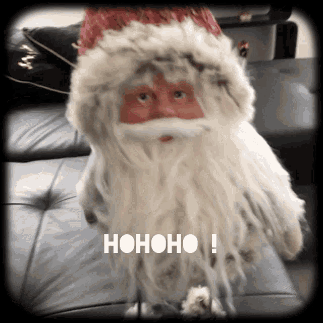 a picture of a santa claus with the word hohoho written on it
