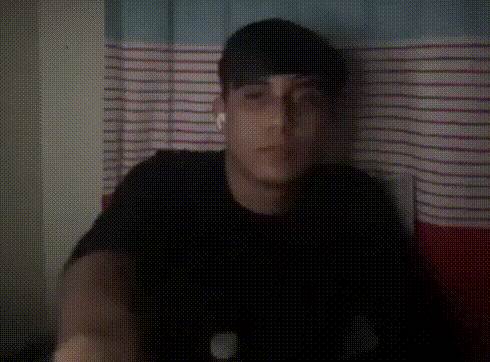 a blurry picture of a man wearing a black shirt