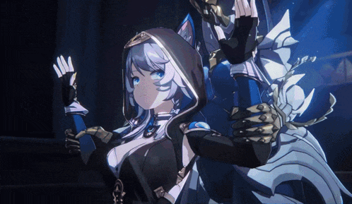 a girl with a hood on her head is being held by a man