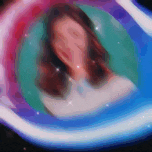 a blurry picture of a woman 's face in a circle