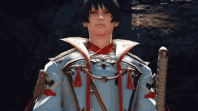 a video game character with a sword and a blue jacket