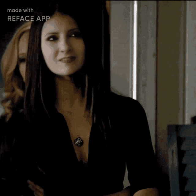 a woman wearing a black shirt and a necklace is being made with reface app