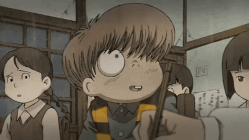 a boy in a striped shirt is holding a pencil in his right hand