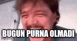 a man with a mustache is laughing with the words `` bugun purna olmadi '' written on his face .