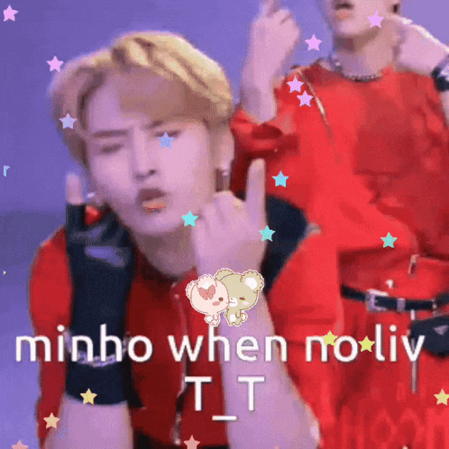 a man in a red shirt is giving the middle finger and says minho when no liv