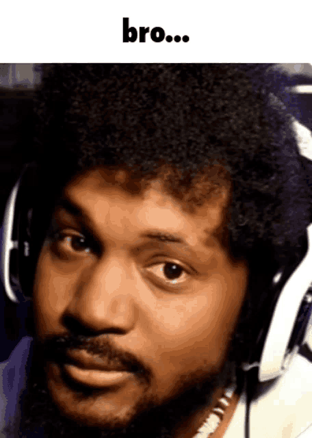 a man with a beard is wearing headphones and the word bro is above him