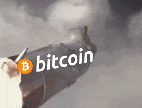 a person is holding a gun with the word bitcoin written on it