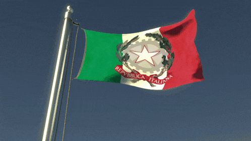 a flag that says repubblica italiana is flying in the wind