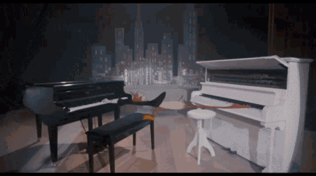 a black and white piano with a city skyline behind it