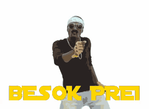 a man wearing sunglasses and a headband is dancing with the word besok pret written in yellow