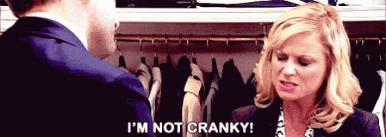 a man and a woman are talking in a closet and the woman says i 'm not cranky .