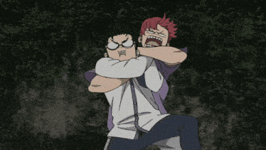 a man with red hair is carrying another man on his shoulders