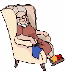 an elderly woman is sitting in a chair with her feet up