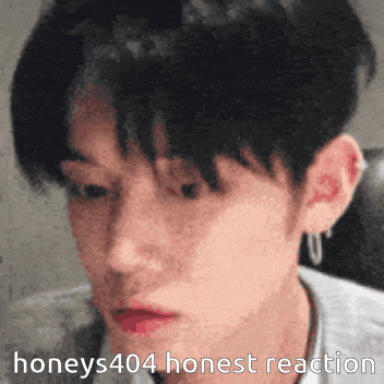 a close up of a person 's face with the words honeys404 honest reaction written on the bottom