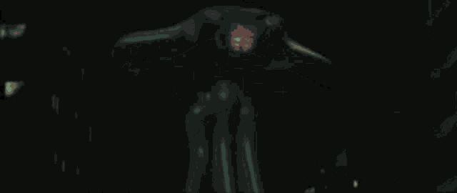 a giant squid with glowing eyes is standing in the dark .