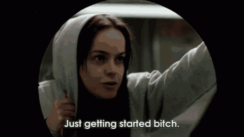 a woman in a hoodie is saying " just getting started bitch "