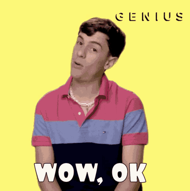 a man in a striped shirt says wow ok on a yellow background