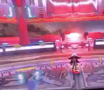 a blurred image of a video game with the letter l on the bottom left