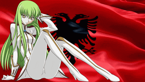 a green haired anime character is sitting in front of a red flag
