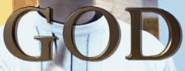 a close up of the word god on a white background