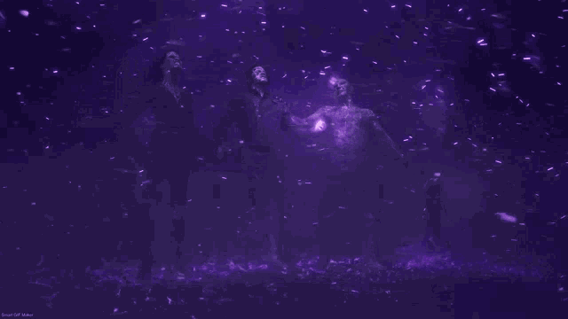 a group of people are holding hands in a purple background