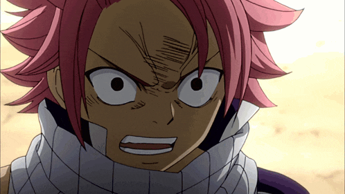 a close up of a cartoon character with red hair and a scarf around his neck