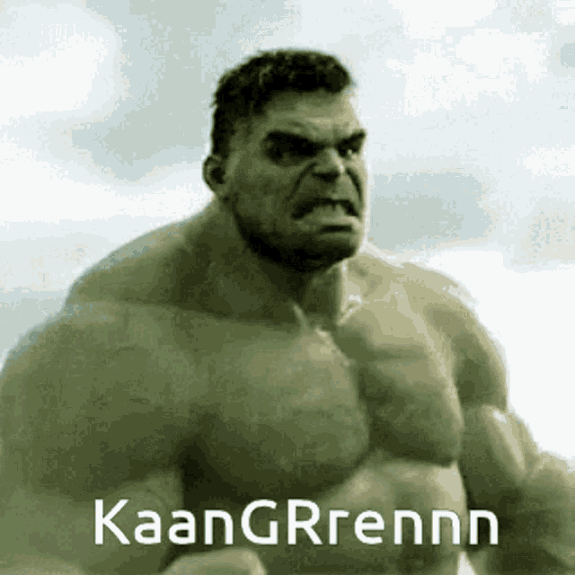 a hulk is standing in front of a cloudy sky with the words kaangrrenn written on the bottom .
