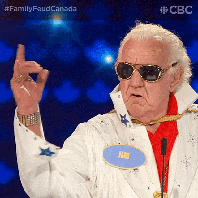 an older man wearing sunglasses and a name tag that says jim