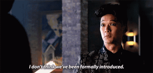 a man in a suit is talking to another man and says i don 't think we 've been formally introduced