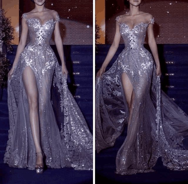 a woman in a long silver dress is standing on a set of stairs