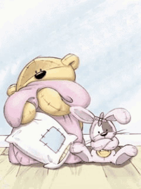 a teddy bear is holding a pillow next to a stuffed rabbit