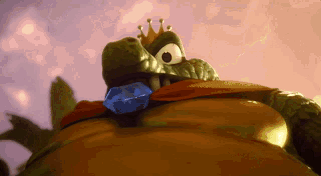 a crocodile with a crown on its head and a blue jewel in its mouth