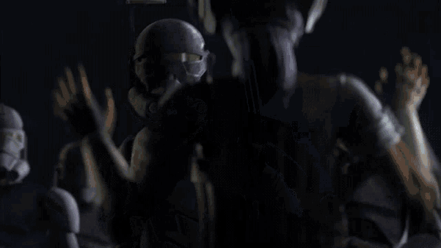 a blurred image of a woman standing in front of a robot