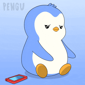 a blue and white penguin is sitting next to a red nintendo ds game