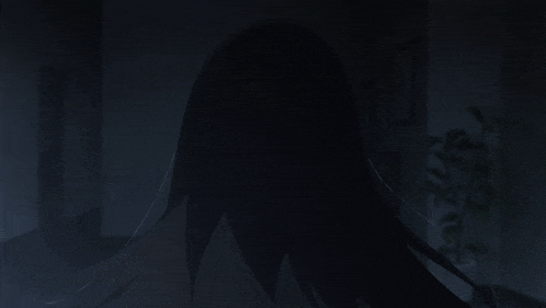a girl with long black hair is running in the dark