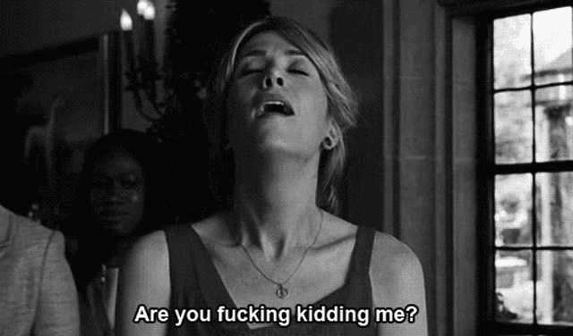a black and white photo of a woman with her eyes closed and the words `` are you fucking kidding me '' .