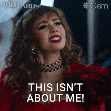 a woman in a red dress says this isn t about me