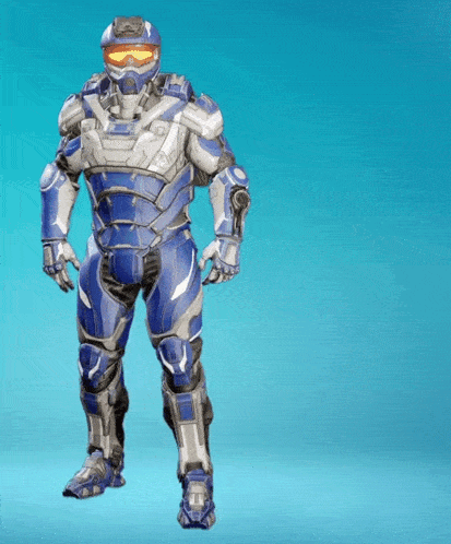 a man in a blue and silver armor with a helmet on stands in front of a blue background