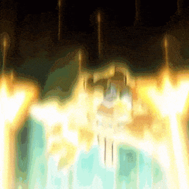 a blurry picture of a castle with a lot of flames