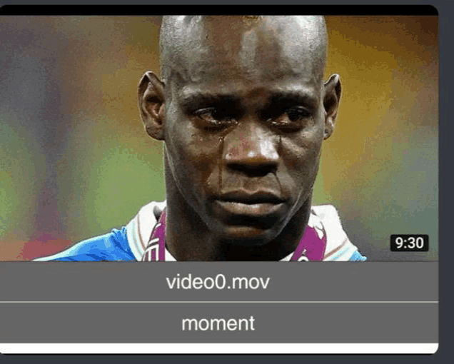 a soccer player is crying with a tear running down his face .