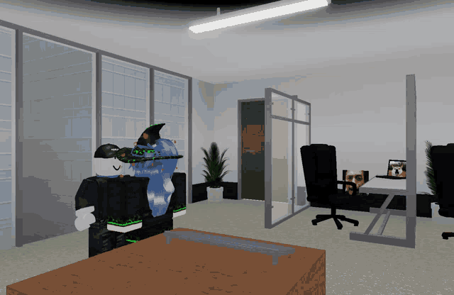 a girl in a witch hat is in an office