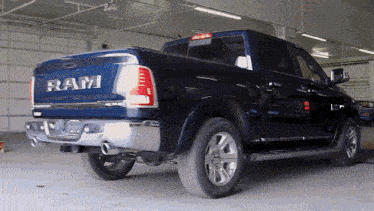 a ram truck is parked in a garage
