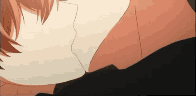 a close up of a person 's face with a white shirt on .