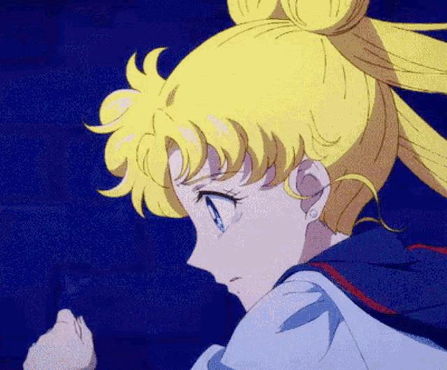 a close up of a girl with blonde hair