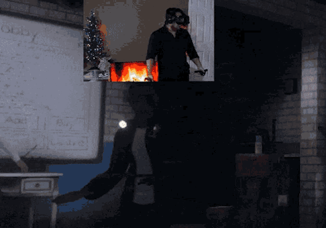 a man wearing a virtual reality headset is standing in front of a white board that says " add " on it
