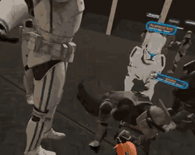a storm trooper is standing in the middle of a video game .