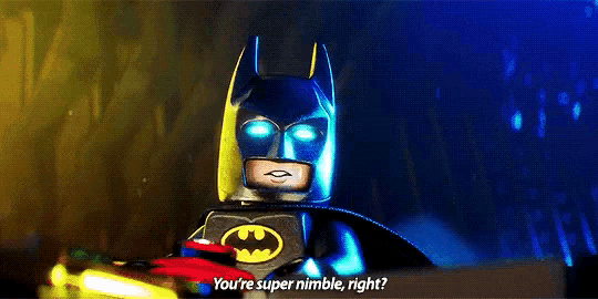 a lego batman is holding a sword and saying you 're super nimble , right ?