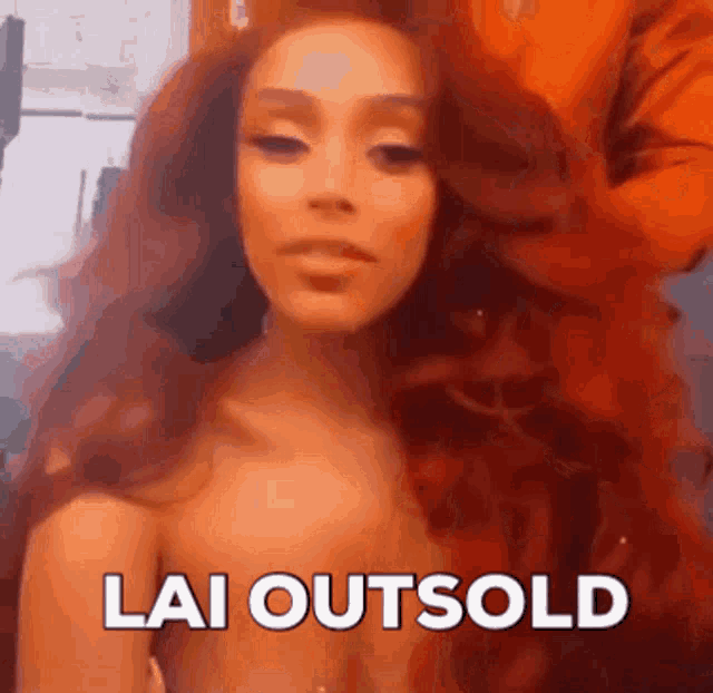 a close up of a woman 's face with the words lai outsold written on it
